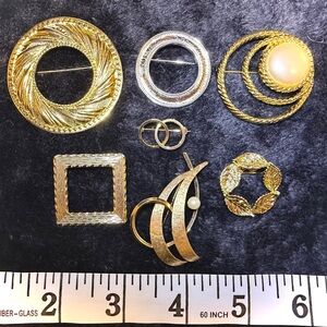 Bundle of 7 Vintage Gold-Tone and Silver-Tone Brooches